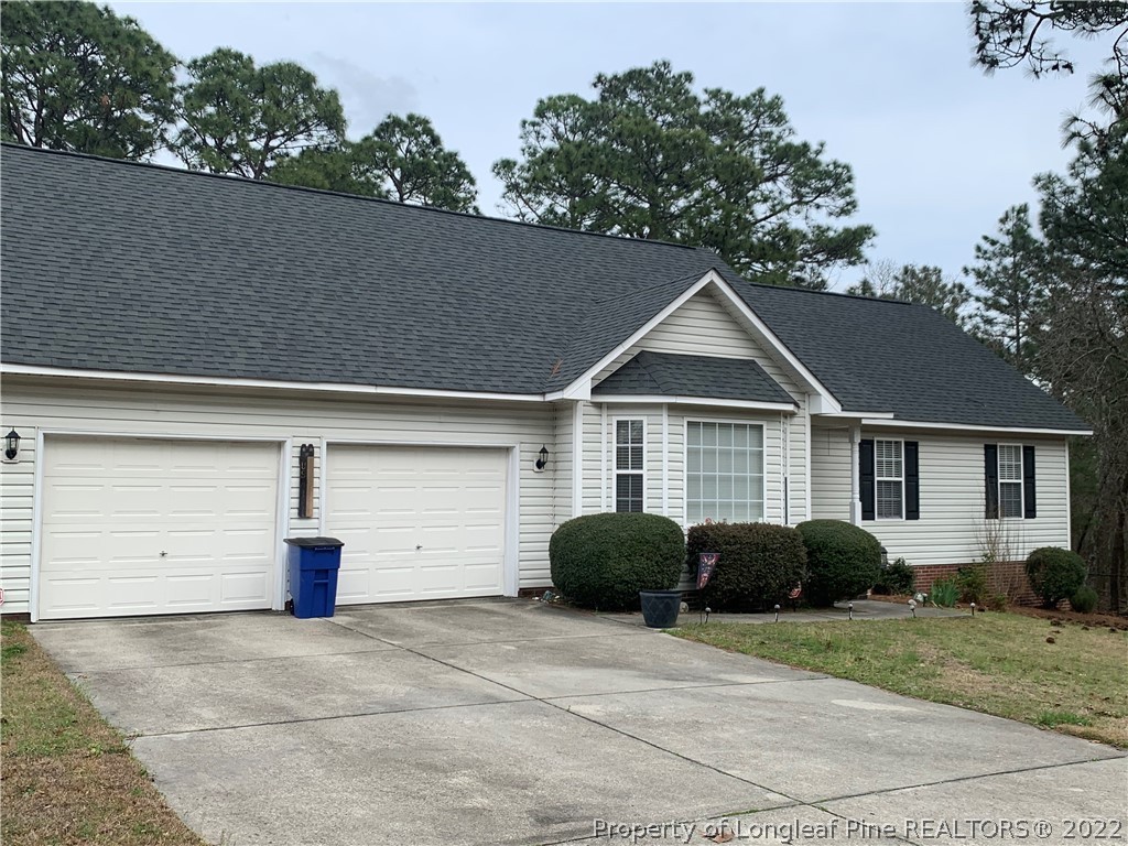 4481 Virsalli Loop Hope Mills, NC 28348 - Photo 24 of 24 a view of a house with a yard