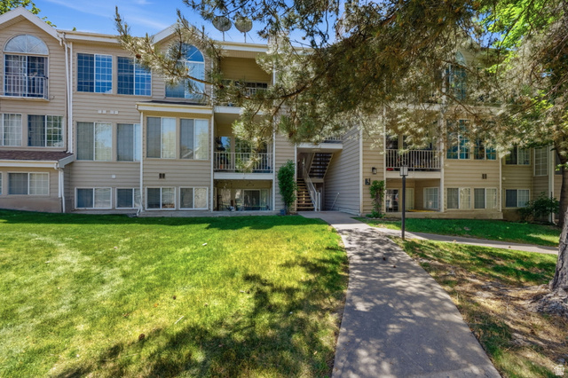 650 South Main Street, Unit 3304 Bountiful, UT 84010 - Photo 22 of 22 Multi-level residential building featuring various window styles and balconies