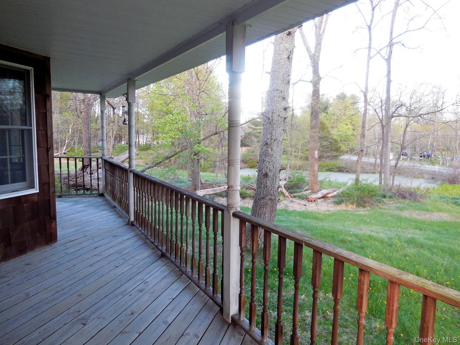 617 Burlingham Road Bloomingburg, NY 12721 - Photo 21 of 39 Front porch overlooks pond.