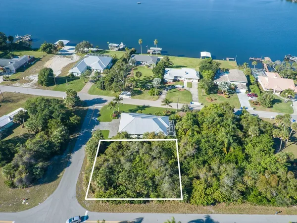 a view of a lake in middle of the house