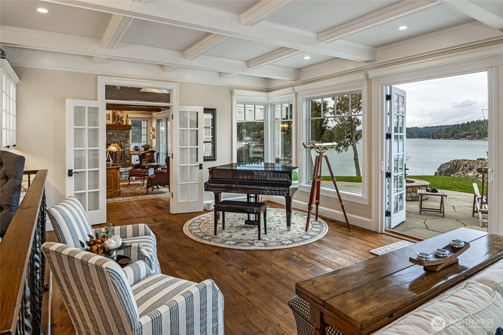 95 Laurel Point Lane Friday Harbor, WA 98250 - Photo 10 of 40 a living room with furniture and a floor to ceiling window