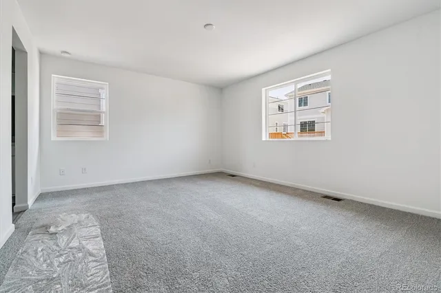 an empty room with windows