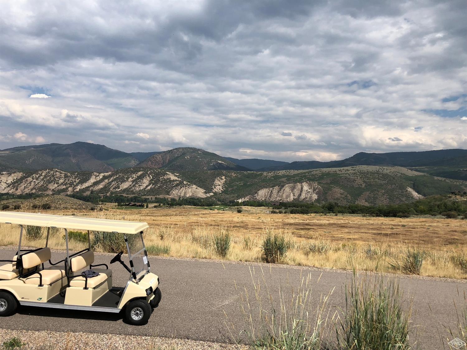 283 Squires Lane Eagle, CO 81631 - Photo 12 of 17 a view of a lake with houses in the back