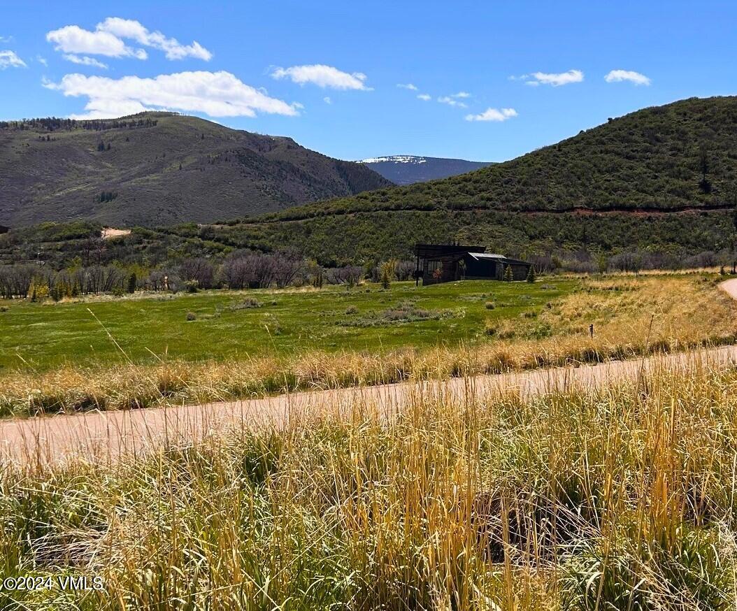 283 Squires Lane Eagle, CO 81631 - Photo 3 of 17 a view of a lake with a mountain
