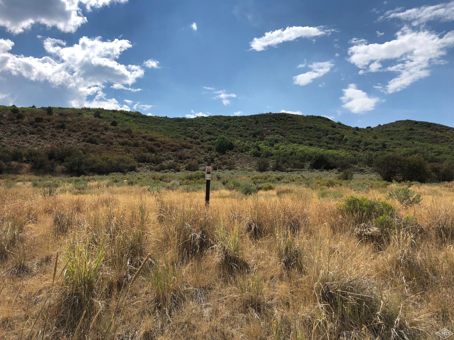 283 Squires Lane Eagle, CO 81631 - Photo 5 of 17 a view of lake with mountain