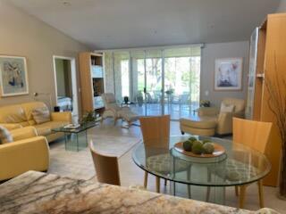 73446 Dalea Lane Palm Desert, CA 92260 - Photo 7 of 17 a living room with furniture and a fireplace