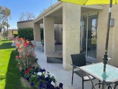 73446 Dalea Lane Palm Desert, CA 92260 - Photo 8 of 17 a front view of a house with a porch