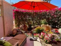 a view of a backyard of the house