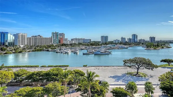 a view of walk in closet and bedroom view