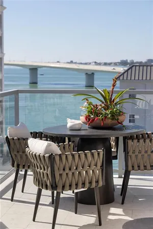 a patio with table and chairs