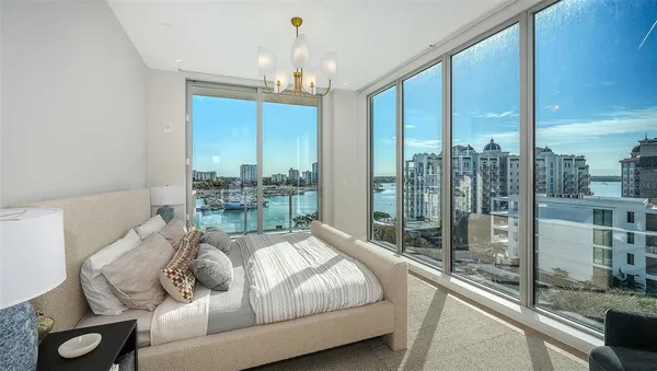 a room with furniture and a chandelier