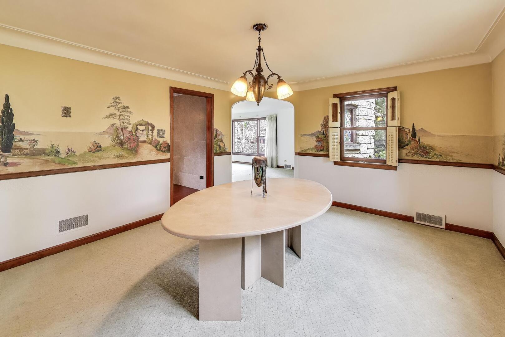 1115 North Ridgeland Avenue Oak Park, IL 60302 - Photo 8 of 40 a view of a dining room with furniture window and wooden floor