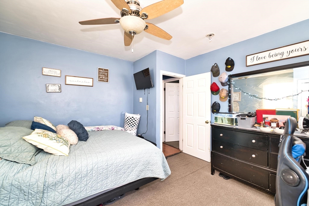 232 Alden Street Fall River, MA 02723 - Photo 26 of 34 a bedroom with a bed and a window
