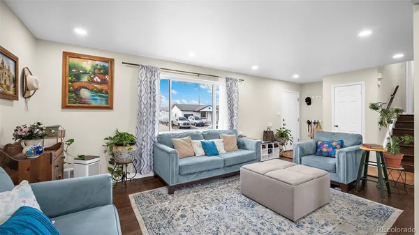 a living room with furniture and a couch
