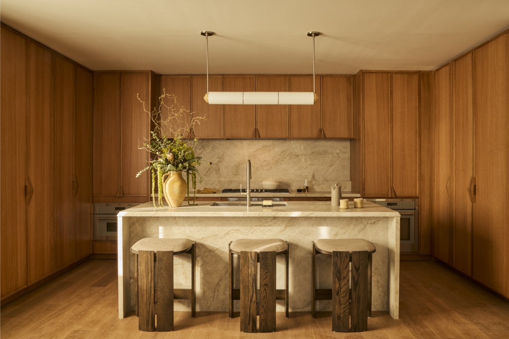 a kitchen with a stove and a refrigerator