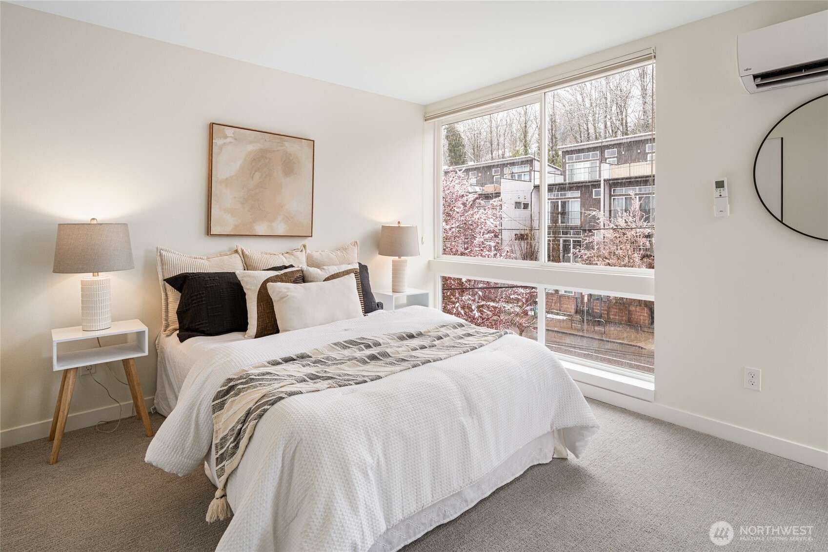 4155 Delridge Way Southwest Seattle, WA 98106 - Photo 13 of 22 a bedroom with bed and a window