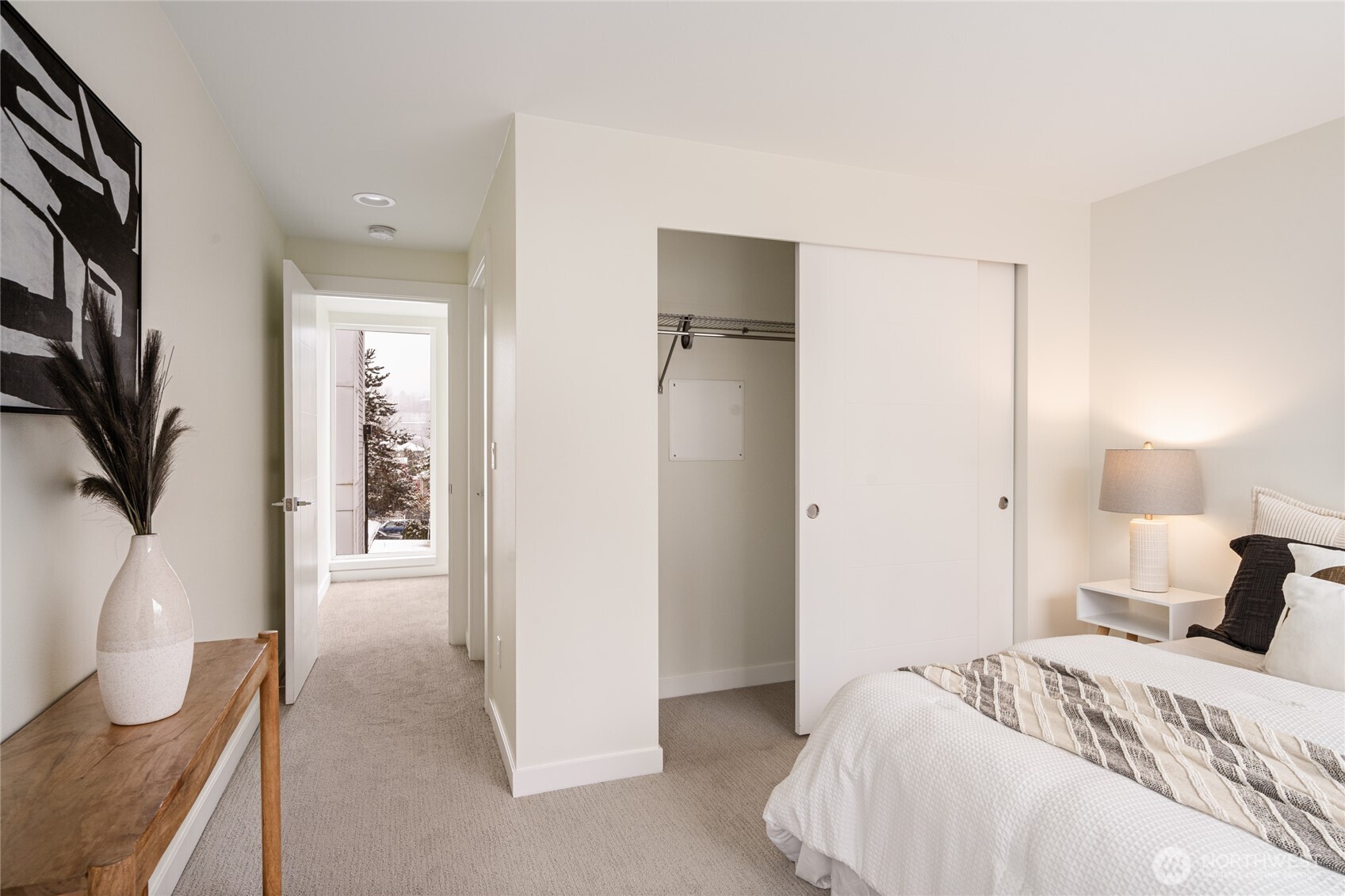4155 Delridge Way Southwest Seattle, WA 98106 - Photo 16 of 22 a bedroom with a bed and a flat screen tv