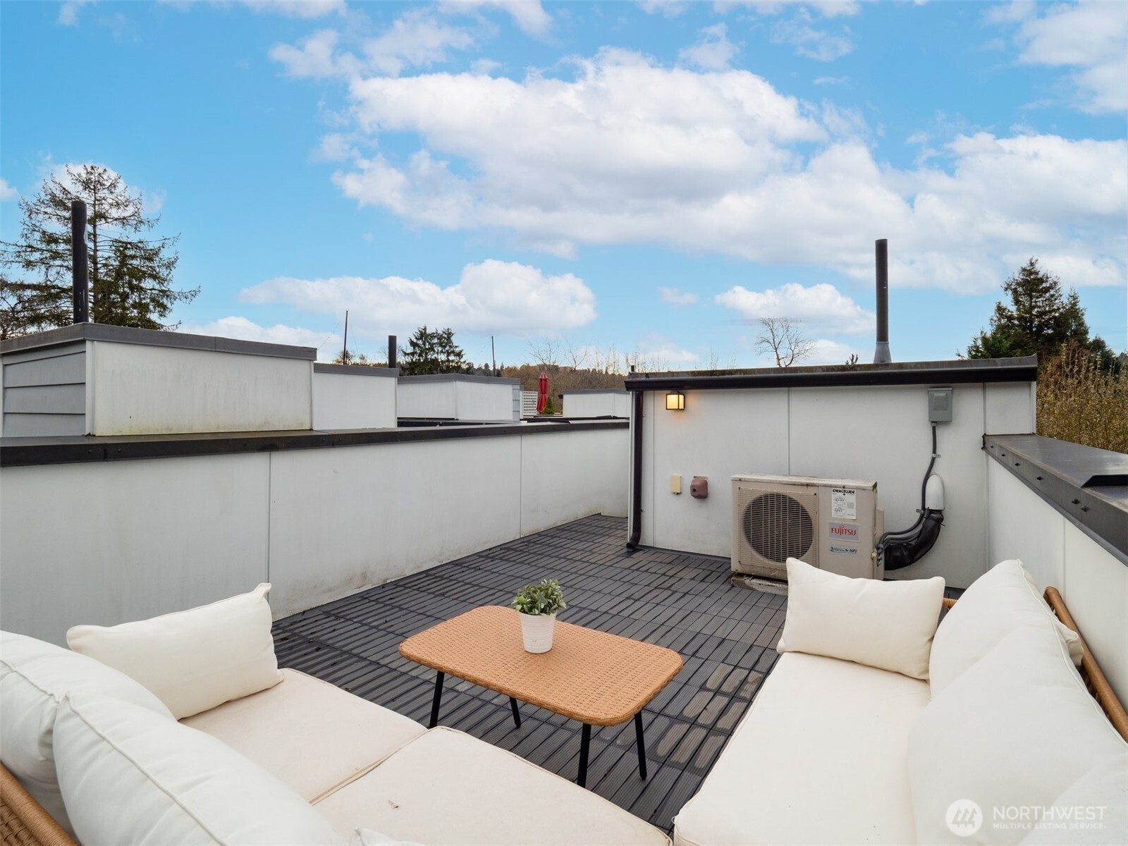 4155 Delridge Way Southwest Seattle, WA 98106 - Photo 18 of 22 a balcony with table and chairs