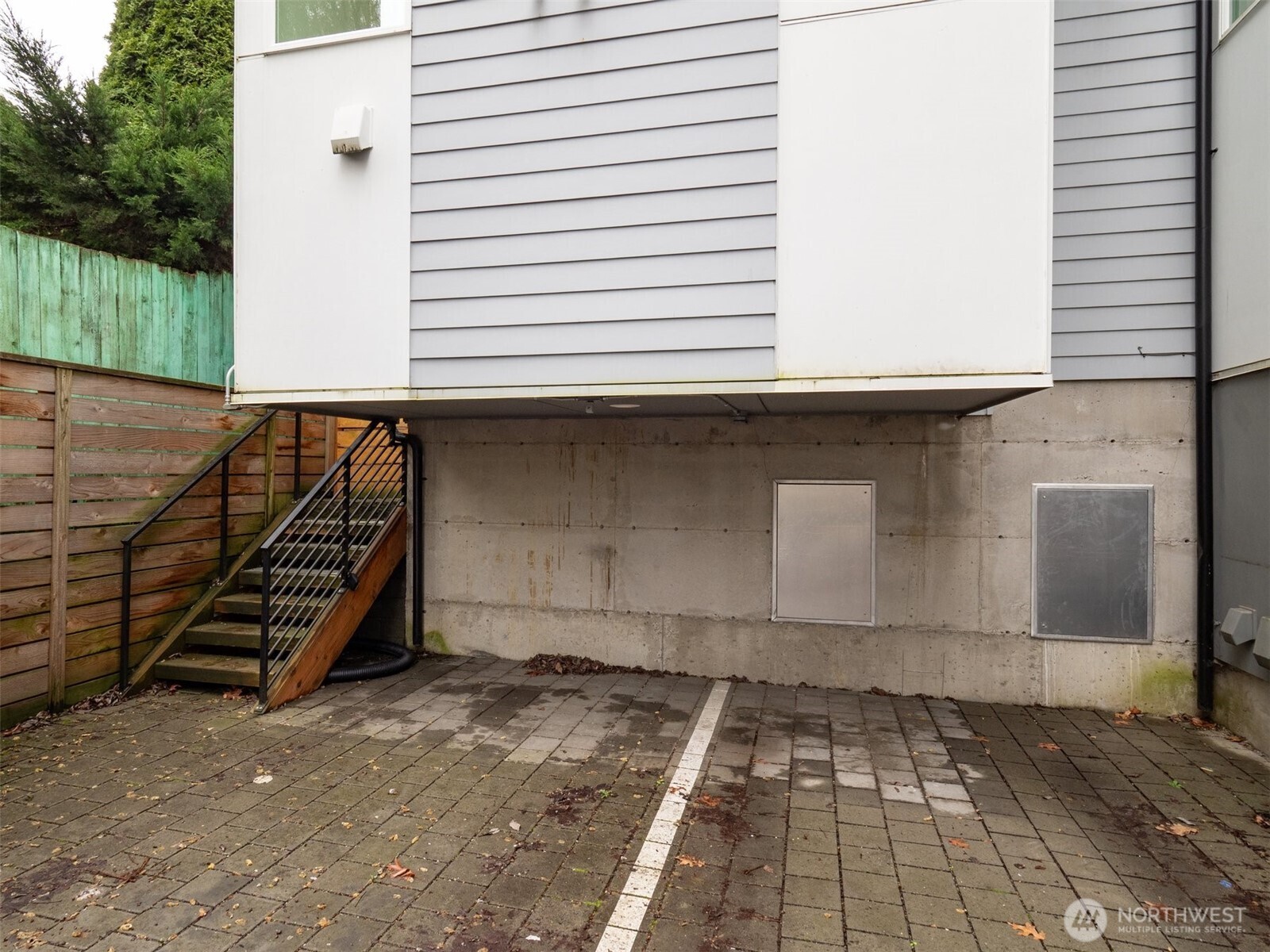 4155 Delridge Way Southwest Seattle, WA 98106 - Photo 19 of 22 a front view of a house with a garage