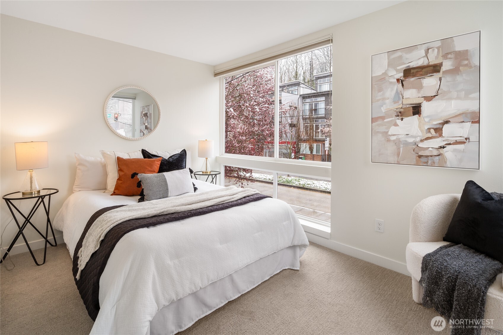 4155 Delridge Way Southwest Seattle, WA 98106 - Photo 8 of 22 a bedroom with a bed and a window