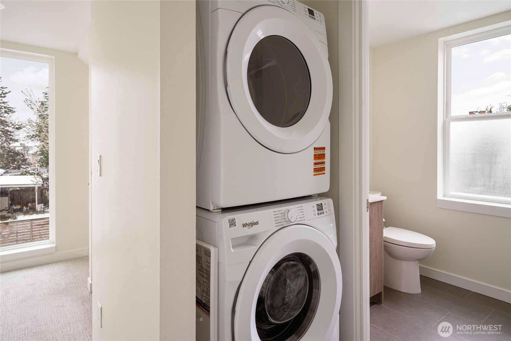 4155 Delridge Way Southwest Seattle, WA 98106 - Photo 10 of 22 a view of a hallway with washer and dryer