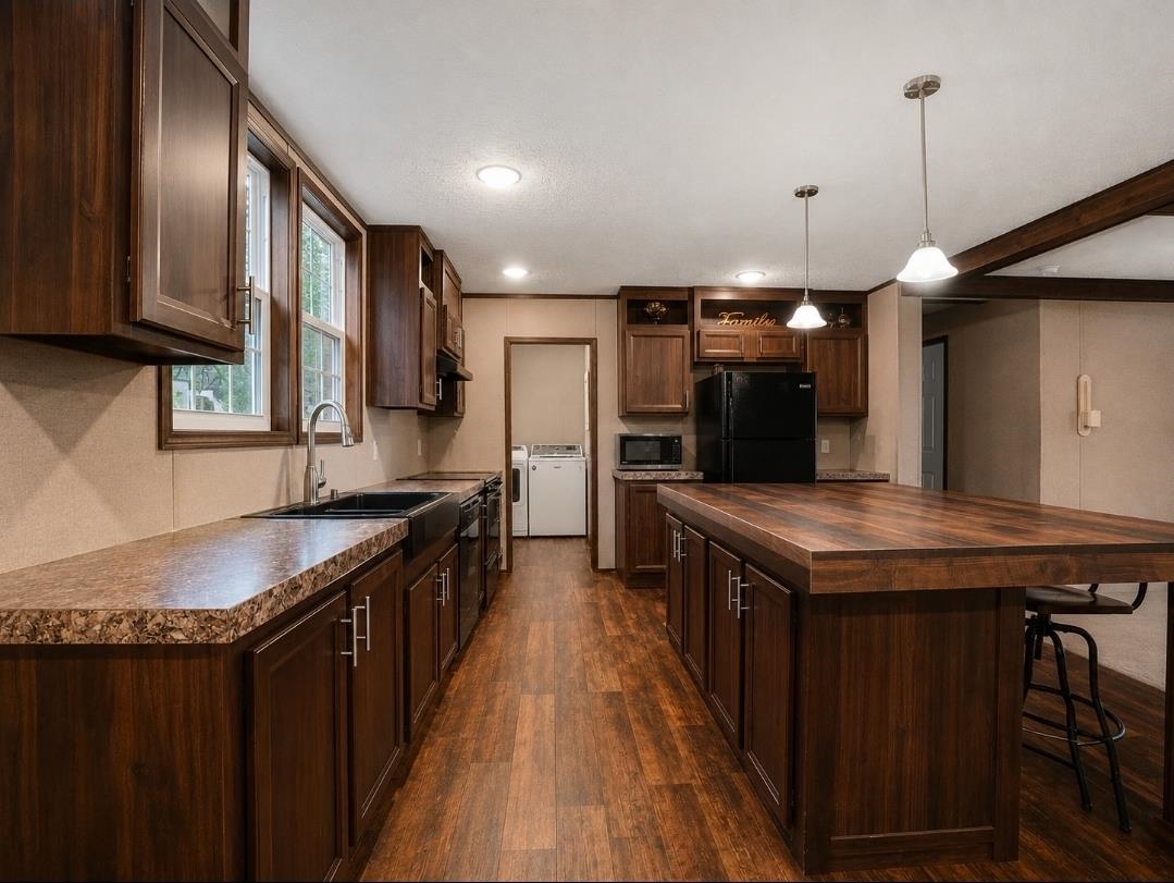 3779 Dancyville Road Stanton, TN 38069 - Photo 15 of 22 Spacious kitchen featuring dark wood-finish cabinetry, wood-finish flooring, and a large center island with seating