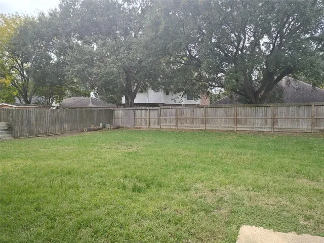 a view of a backyard with a garden