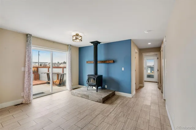 a bathroom with a granite countertop sink a toilet and a bathtub