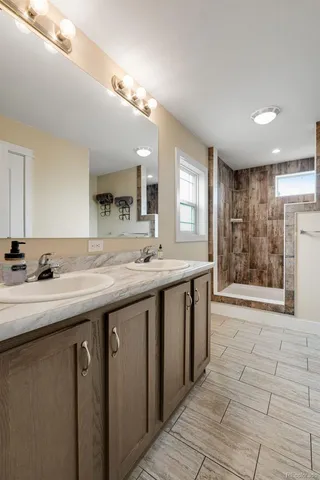a bathroom with a toilet and a rug
