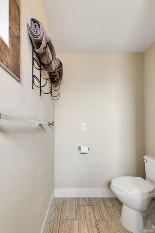 a view of a terrace with a table and chairs