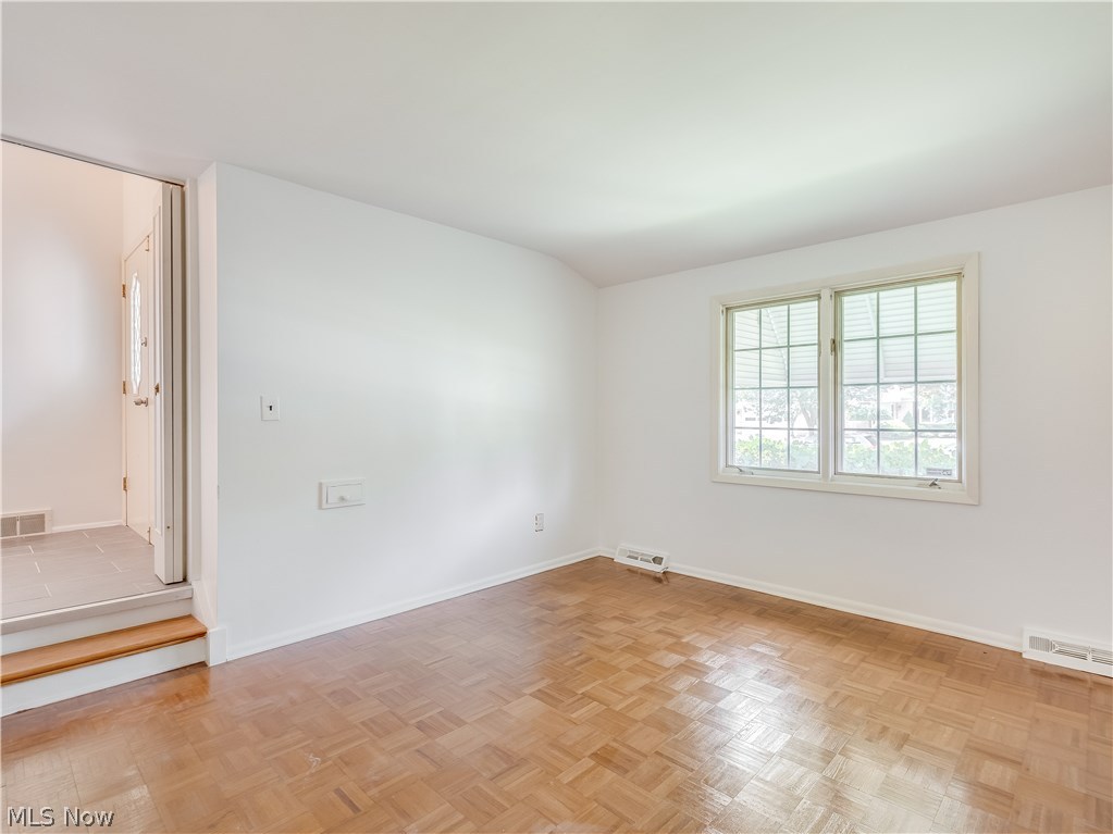 1047 Roland Road Lyndhurst, OH 44124 - Photo 10 of 26 Office / Bedroom / Playroom off the hallway features beautiful parquet wood flooring as well.