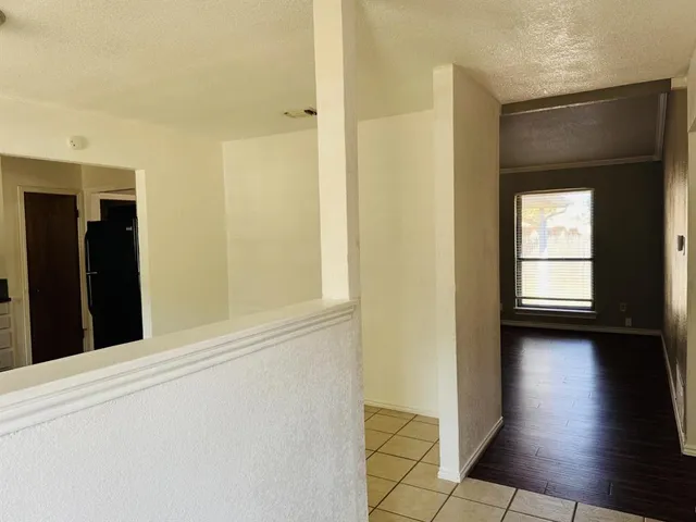 a view of a closet area with living room