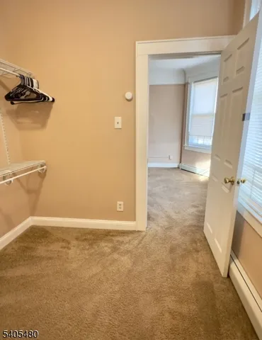 a view of a room with racks on the wall