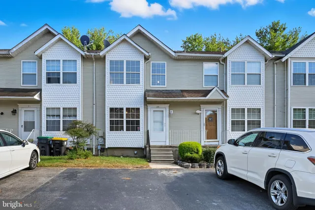 a car parked in front of a house