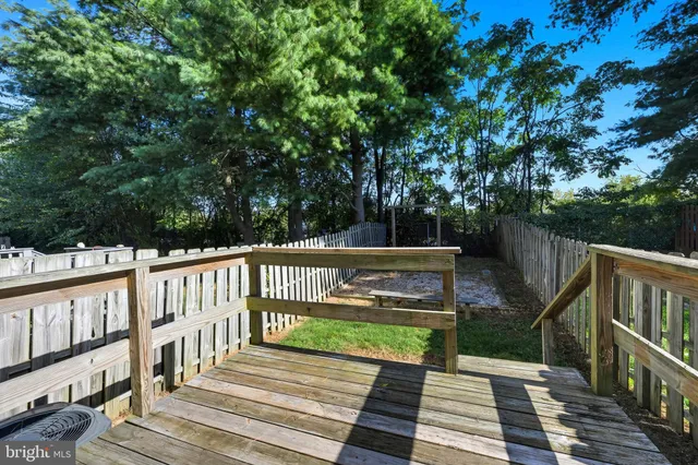 a view of a two chairs on the deck