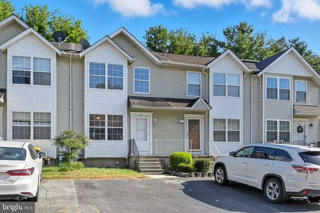 a car parked in front of a house
