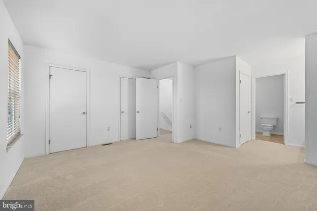 an empty room with windows