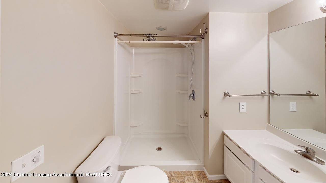 12103 West Greenfield Road Lansing, MI 48917 - Photo 37 of 52 Basement Bathroom