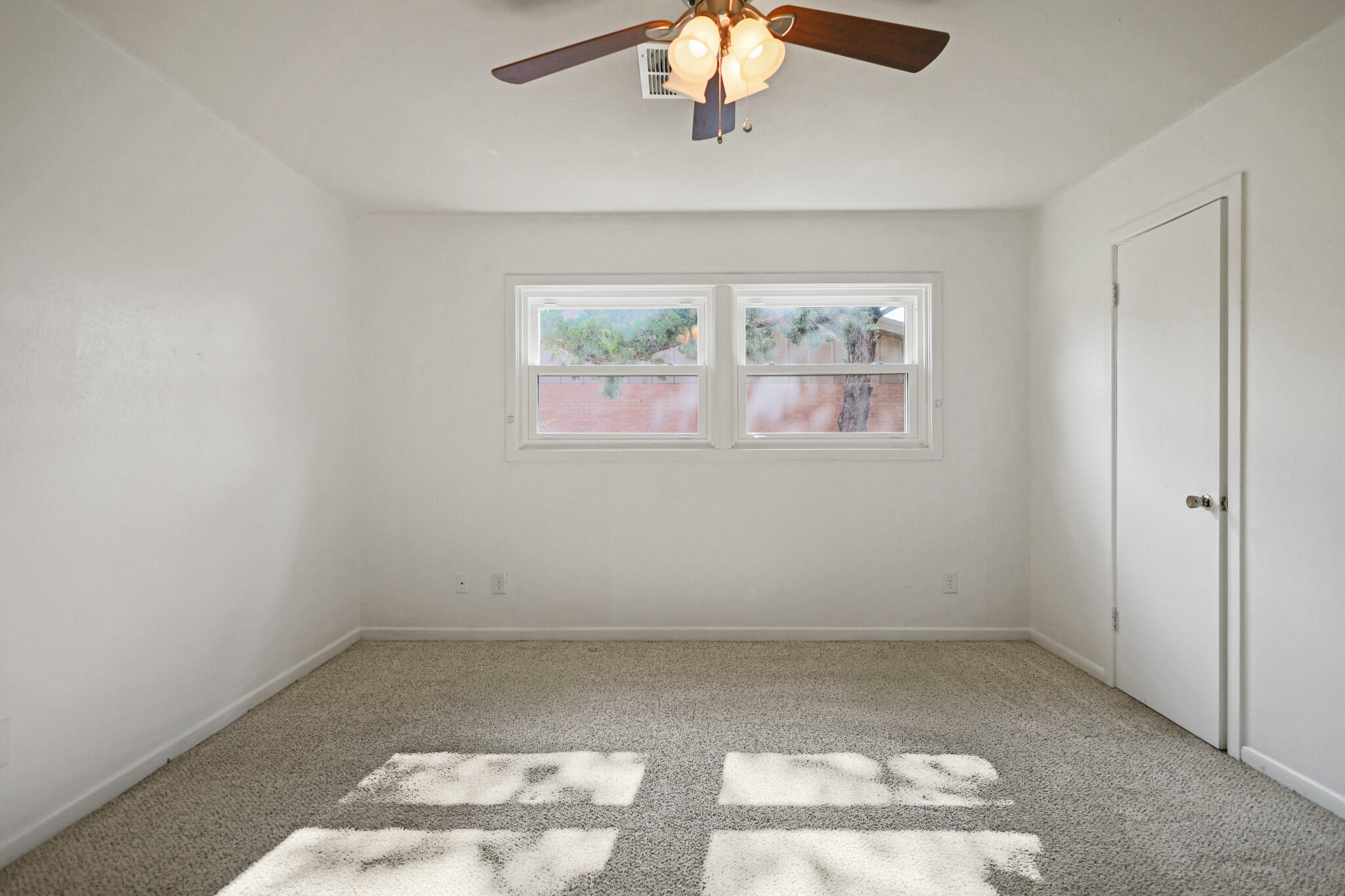 5209 17th Street Lubbock, TX 79416 - Photo 23 of 40 an empty room with a window