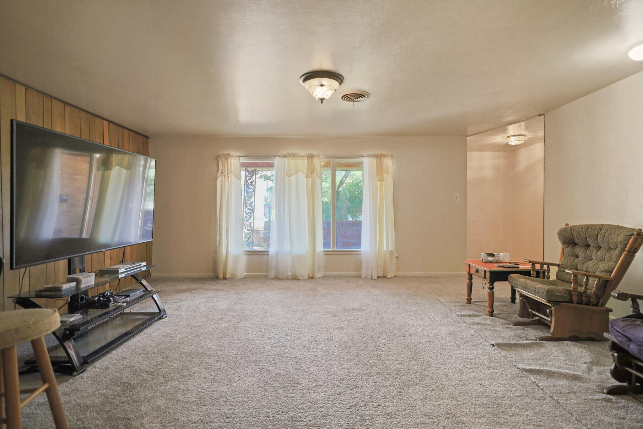 5209 17th Street Lubbock, TX 79416 - Photo 8 of 40 a view of workspace with furniture and windows