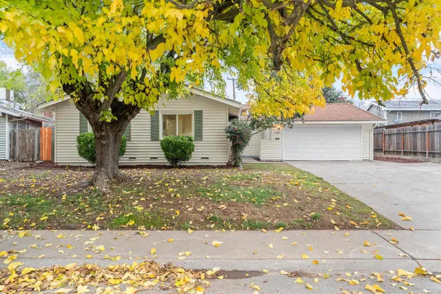 front view of a house with a yard