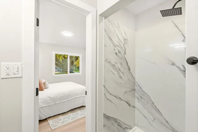 a view of a backyard with sitting area