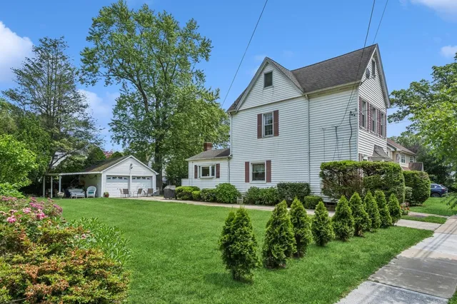 a house view with a garden space