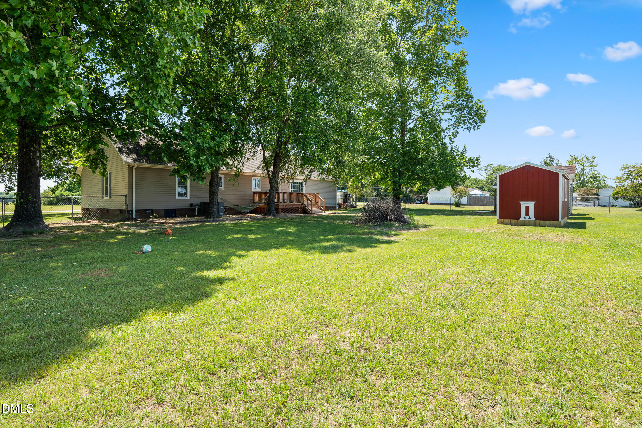 311 Bridgers Road Kenly, NC 27542 - Photo 33 of 46 a view of a house with a yard and sitting area