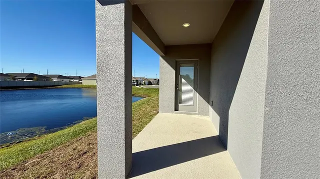 a view of a house with a swimming pool