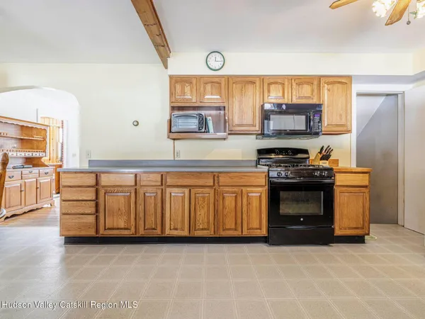 a kitchen with stainless steel appliances a stove and a refrigerator