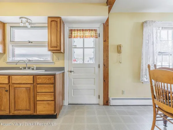 a view of walk in closet with window