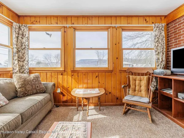 a living room with a couch and a table