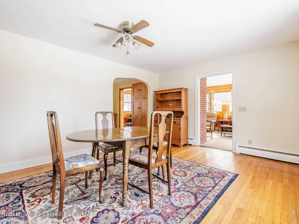 a view of a dining room with furniture