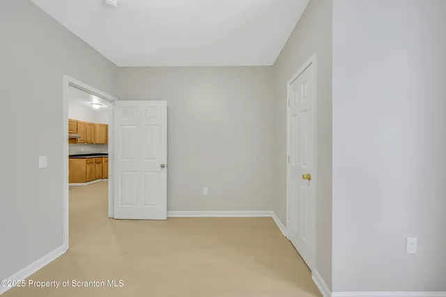 a bathroom with a sink toilet a mirror and shower